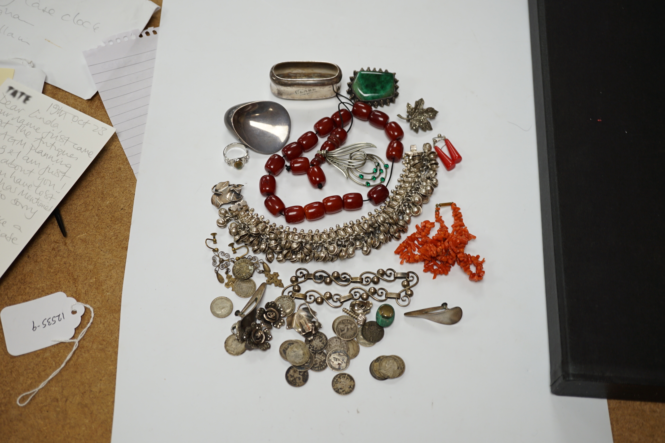 A quantity of assorted jewellery including costume, a pair of Danish sterling ear clips, a 1960's Nanna & Jorgen Ditzel for Georg Jensen sterling silver brooch, no.328, 51mm, a pair of Georg Jensen sterling ear clips, no